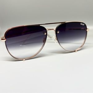 Quay: High Key Sunglasses. Gold frame w/black fade lens